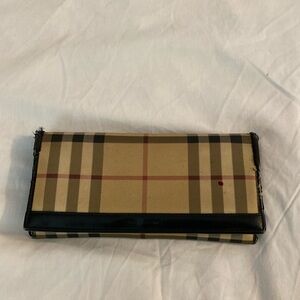 Burberry wallet. Give me your best offer.